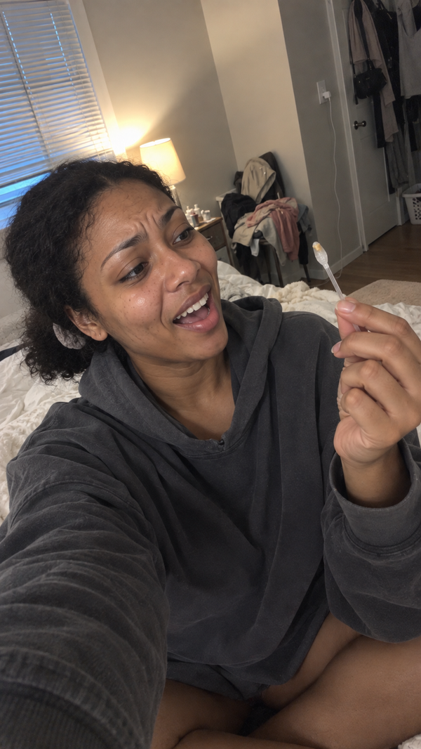 Woman on her bed looking at what the CLARITO tip picked up